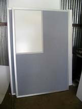 office partition with dry erase board in upper corder